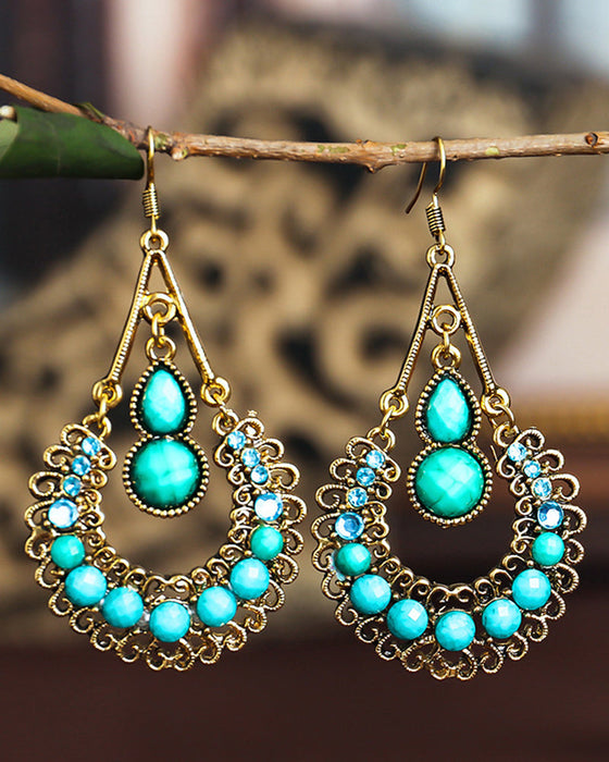 Lange øredobber med dråpeform