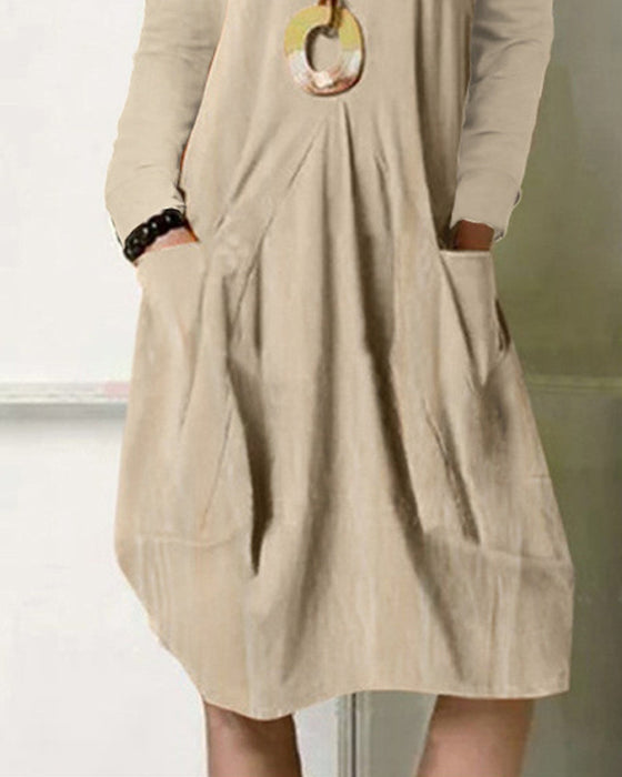 Ensfarget kjole med lommer