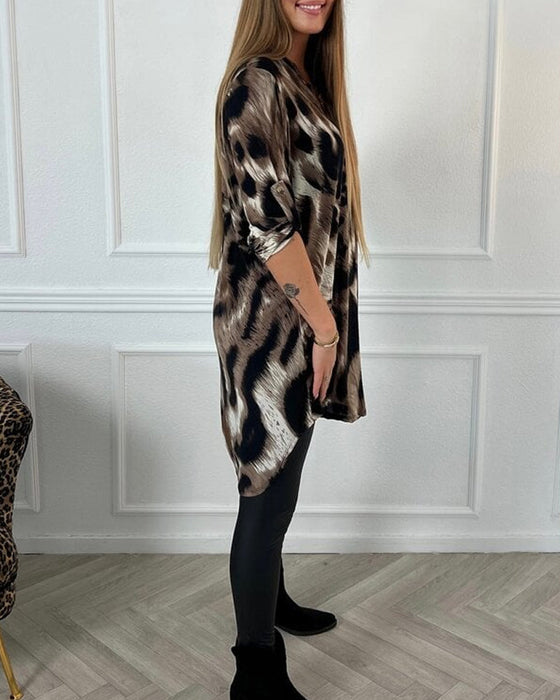 Bluse med eleganse og leopardprint
