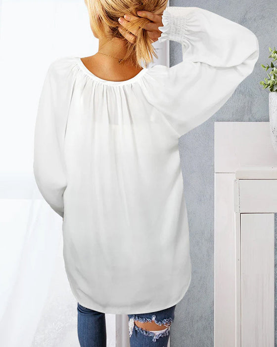 V-halset topp med elastiske mansjetter