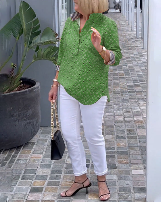 Prikkete jakkeslagsskjorte med 3/4-ermer