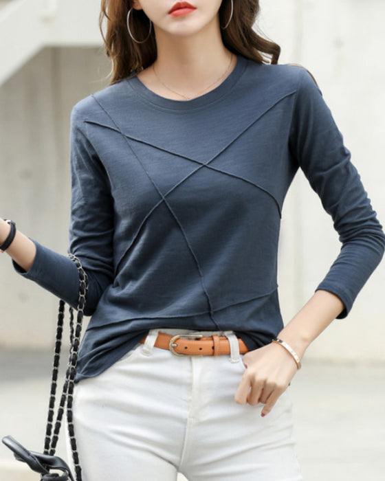 Ensfarget topp med lange ermer med rund hals
