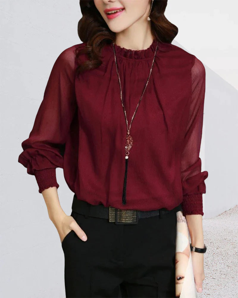 Ensfarget bluse med lanternearm