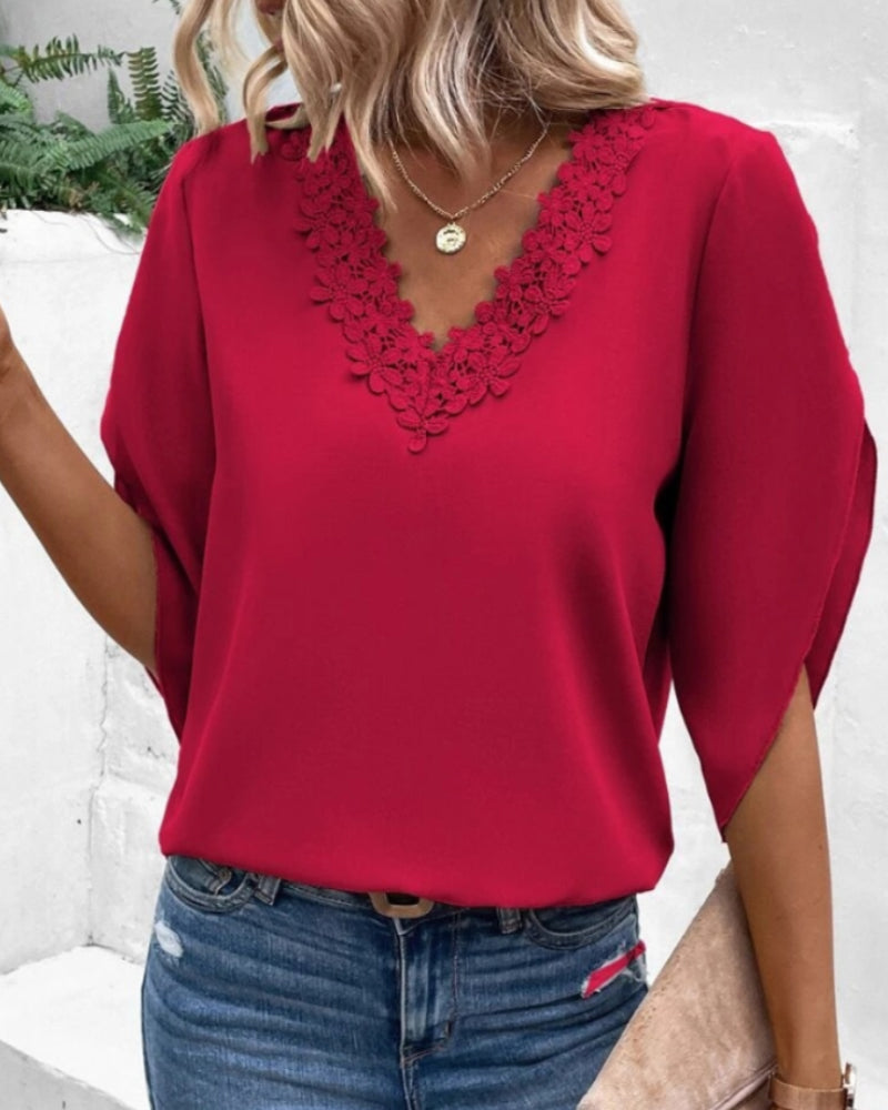 Elegant V-hals topp med blonder