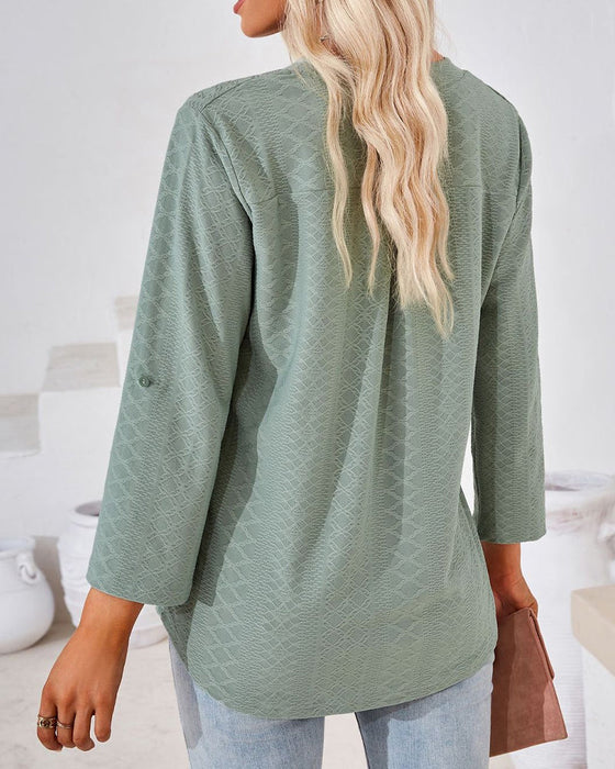 Elegant damebluse med V-hals
