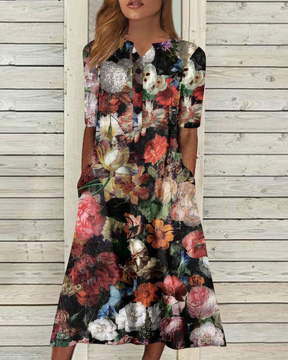 Kjole i blomsterprint med lomme