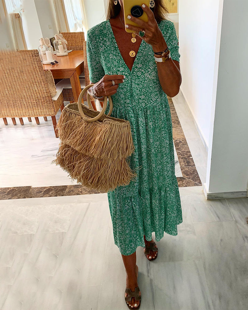 V-hals kjole med blomstertrykk