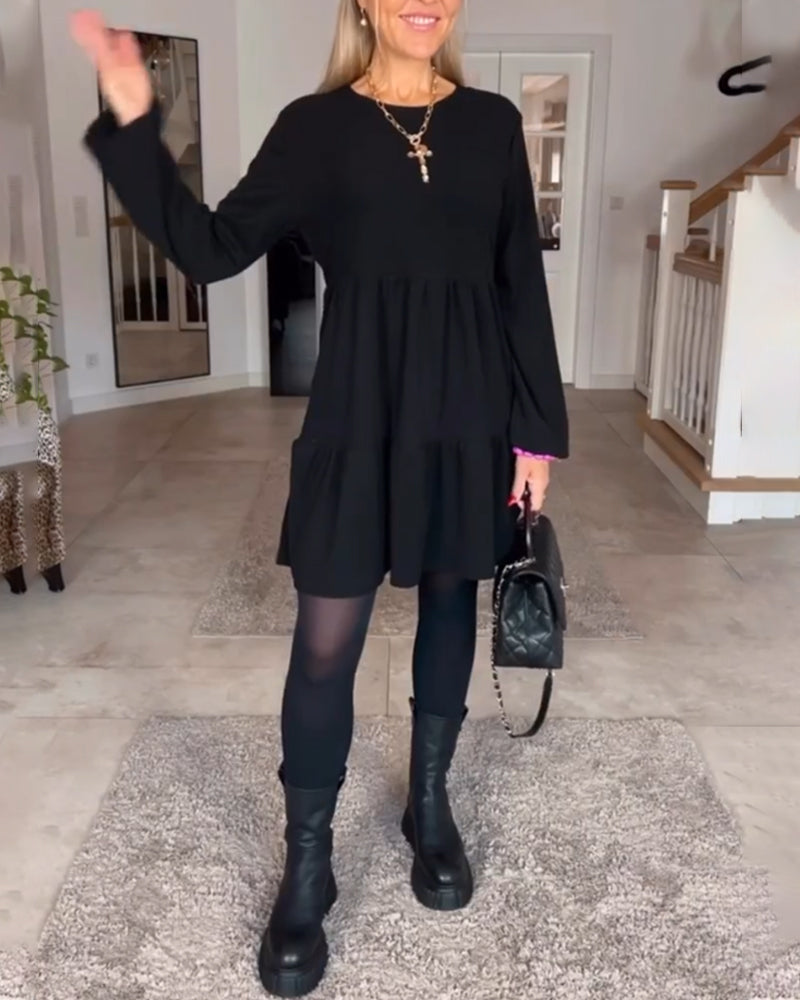 Enkel ensfarget langermet kjole