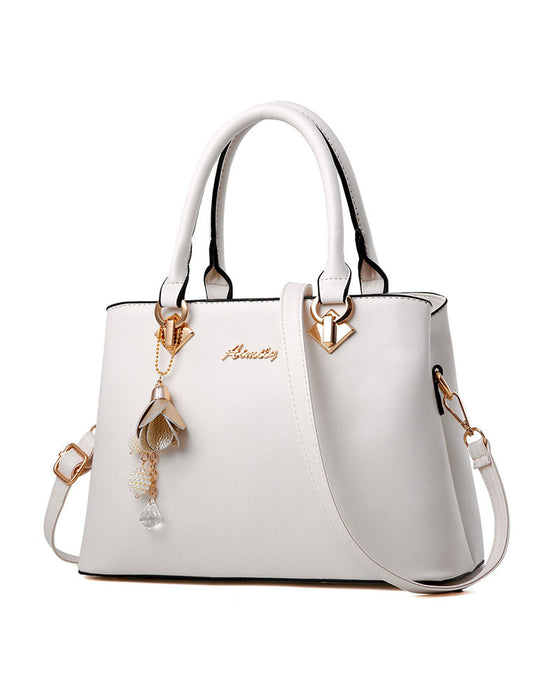 Trendy messenger skulderveske