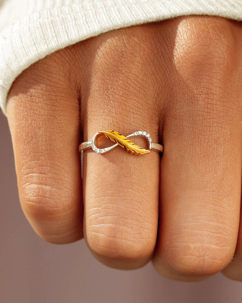 Fjær ring med klassisk tofarget