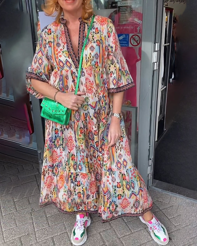 Elegant lang kjole med V-hals