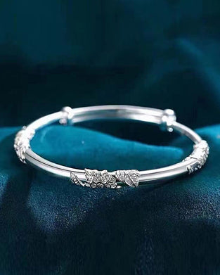 Armbånd med justerbart blomster