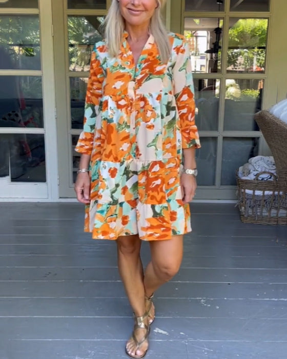 Kjole med V-hals og blomster