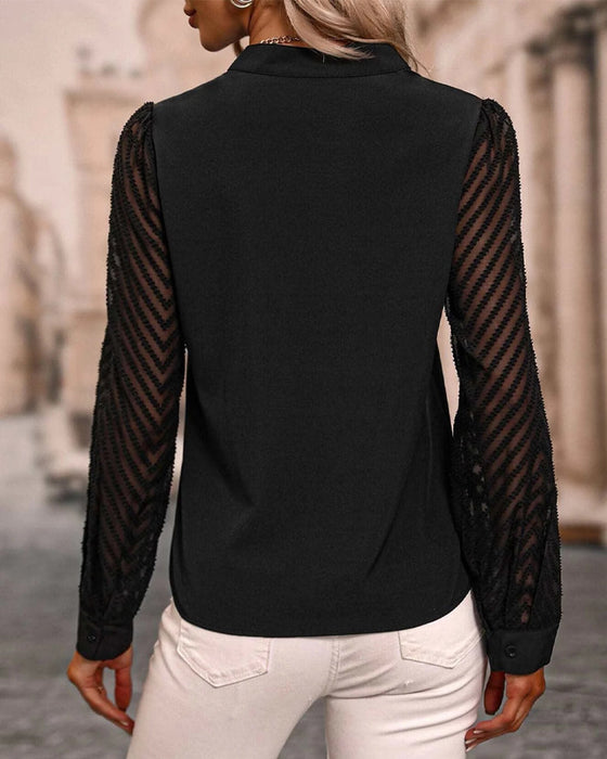 Langermet bluse i ensfarget