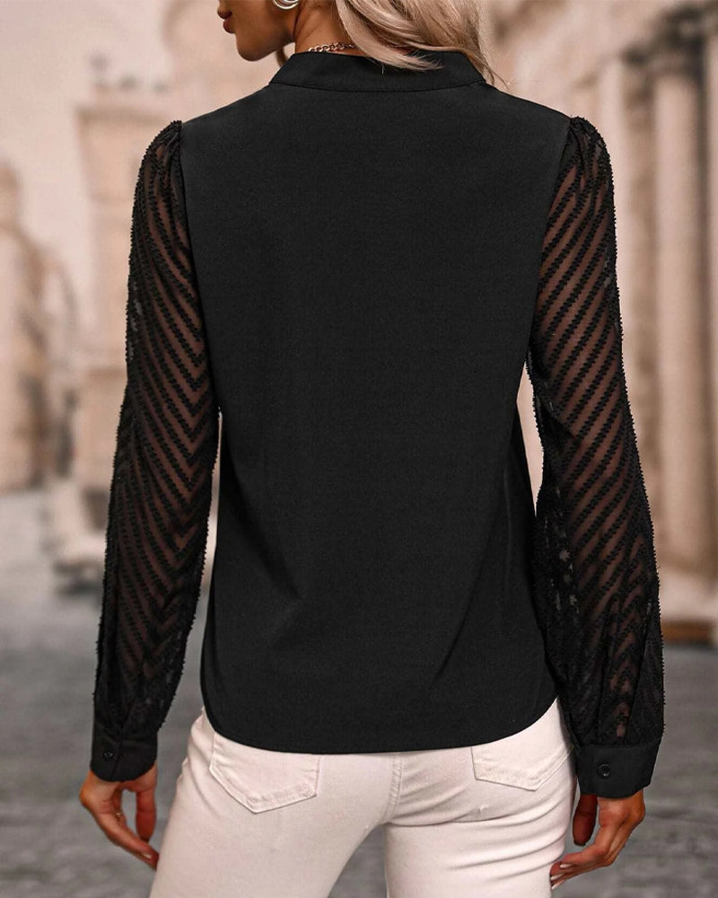 Langermet bluse i ensfarget