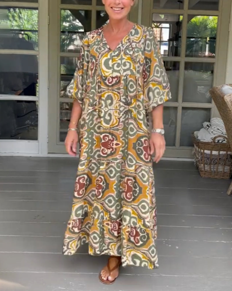 Maxikjole med trykk og V-hals