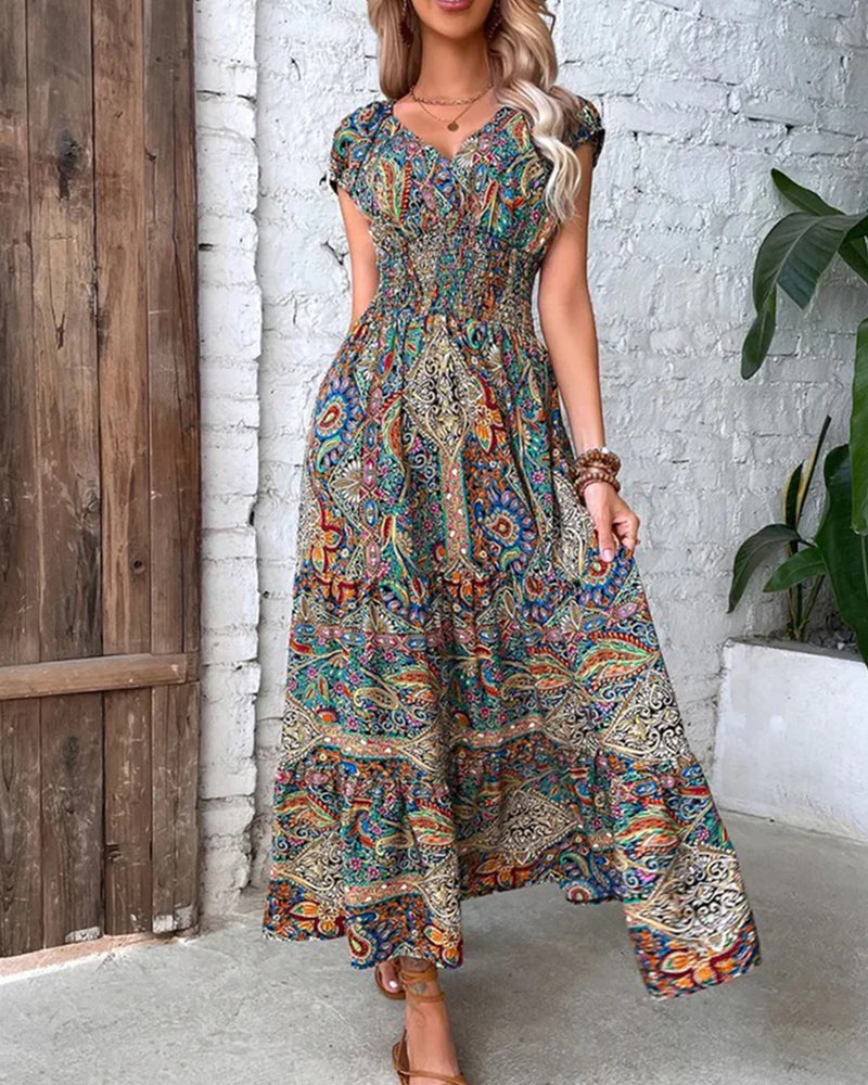 Elegant kjole med vintagetrykk
