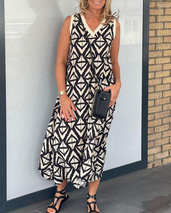 V-hals ermeløs kjole