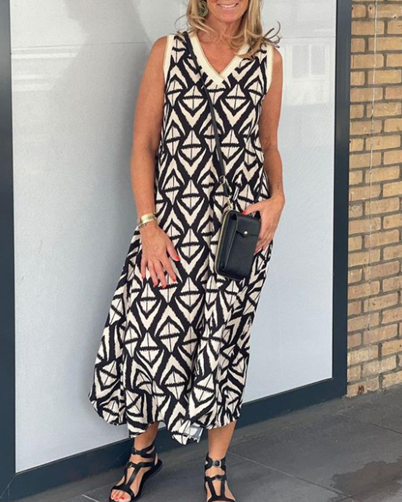 V-hals ermeløs kjole