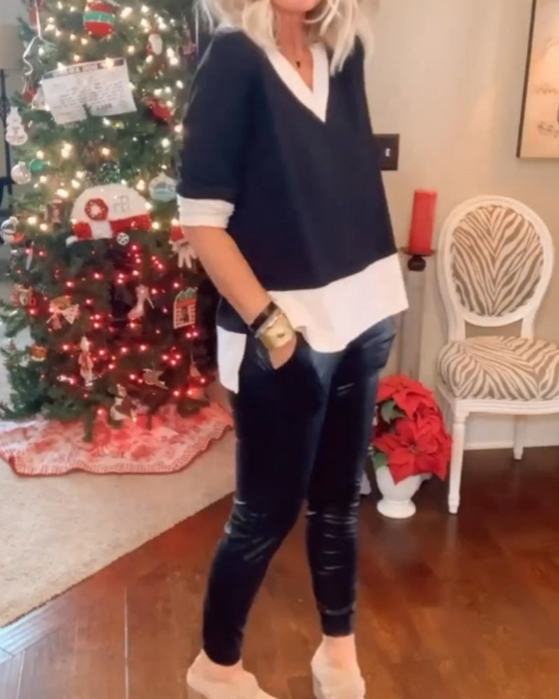 Avslappet topp i fargeblokk v-hals