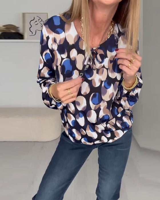 Elegant bluse med trykk med stropper