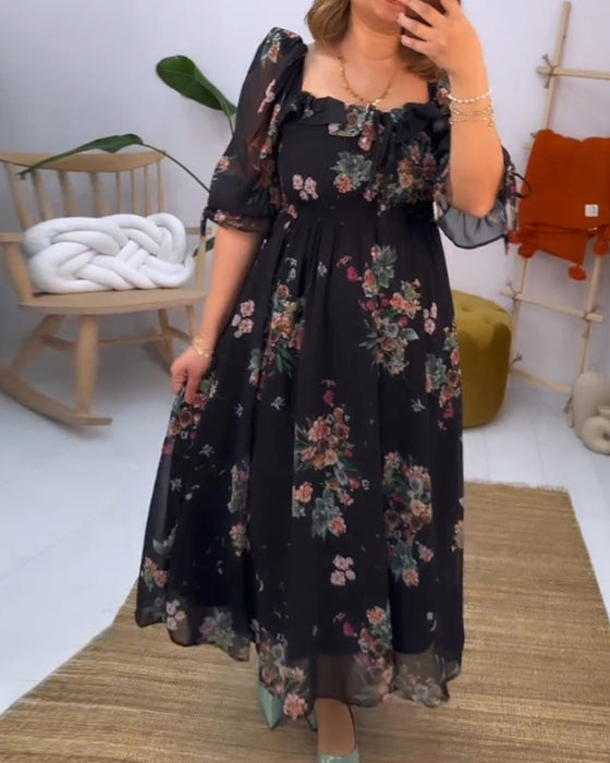 Elegant kjole med firkantet hals med blomstertrykk