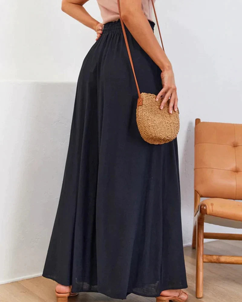 Ensfarget bukse med høy midje og brede ben