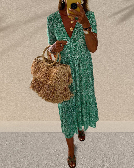 V-hals kjole med blomstertrykk