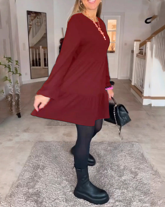 Enkel ensfarget langermet kjole