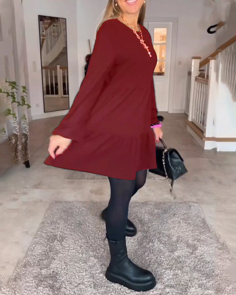 Enkel ensfarget langermet kjole