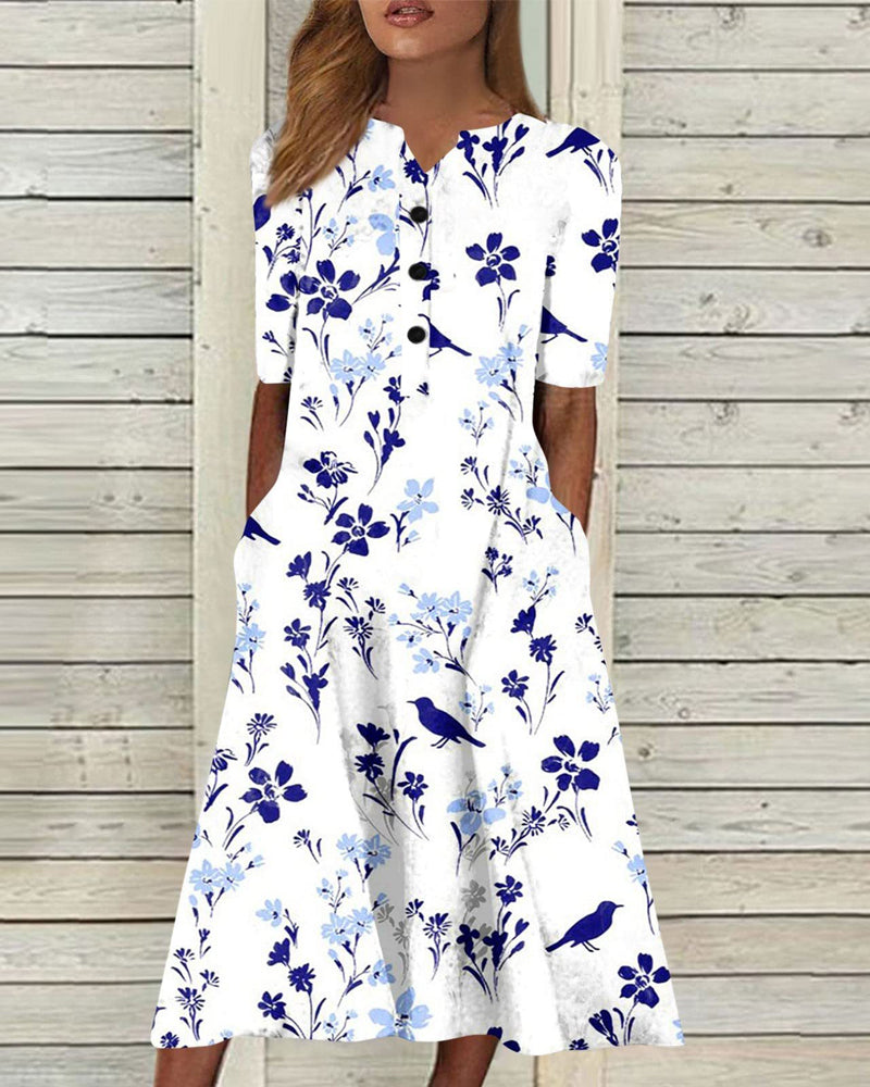 Kjole i blomsterprint med lomme