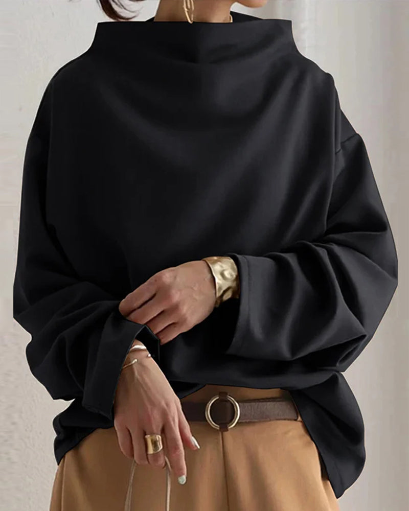 Bluse med løs passform og lange ermer