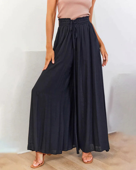 Ensfarget bukse med høy midje og brede ben