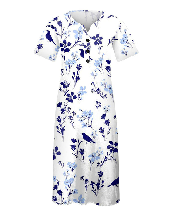 Kjole i blomsterprint med lomme