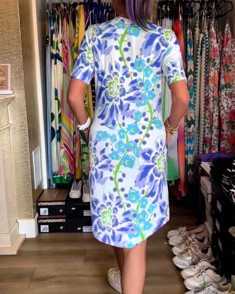 Kjole med korte ermer, blomsterprint og V-hals
