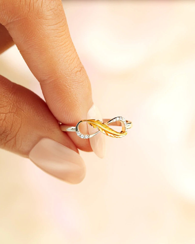 Fjær ring med klassisk tofarget