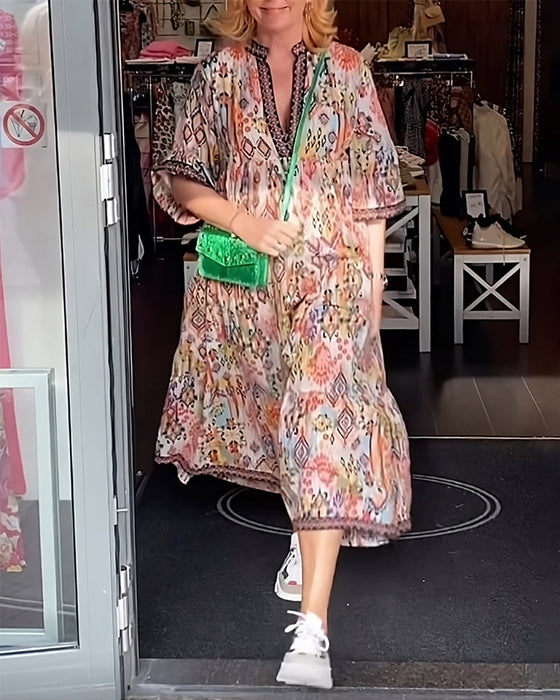 Elegant lang kjole med V-hals