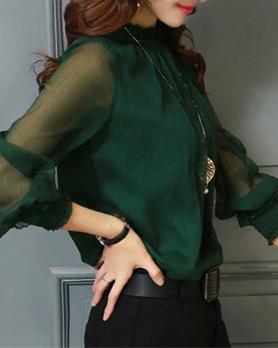 Ensfarget bluse med lanternearm