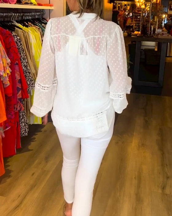 Langermet topp i blondepanel med V-hals