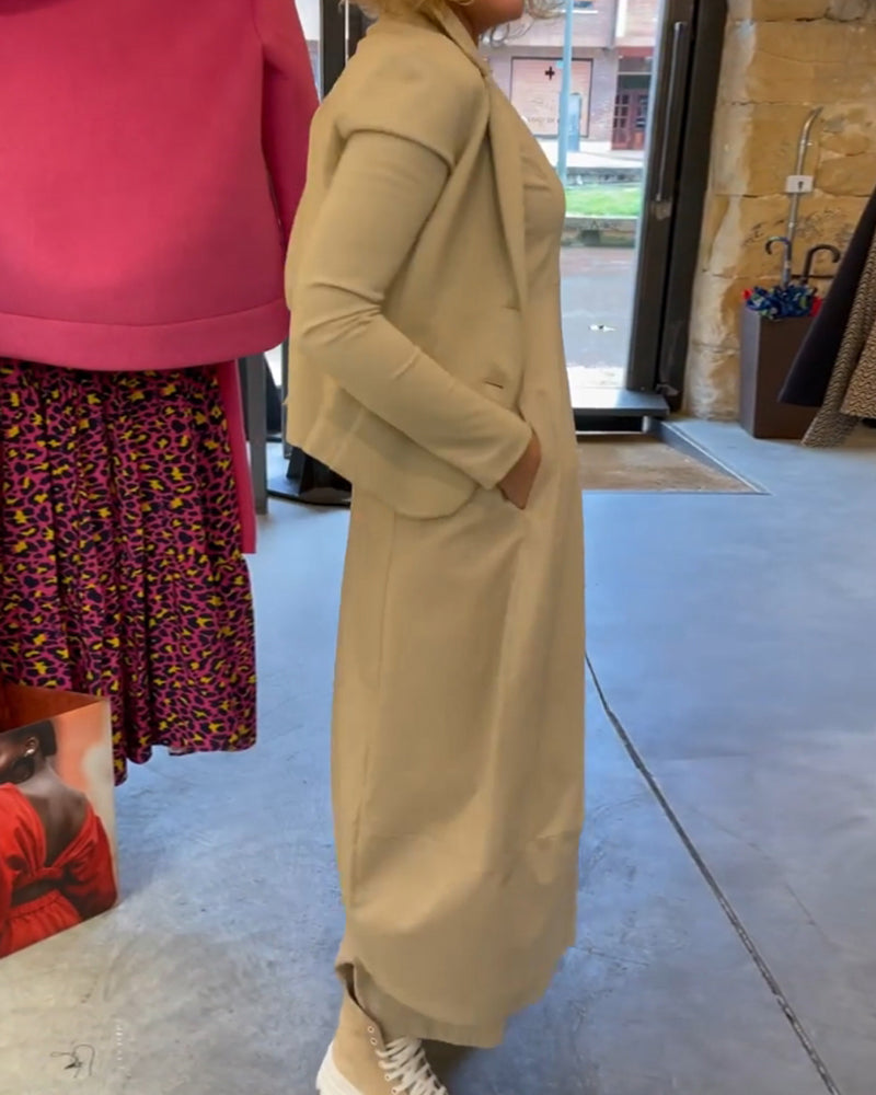 Kjole med ensfarge og lang erme