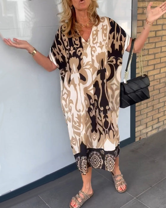 V-hals kjole med geometrisk trykk