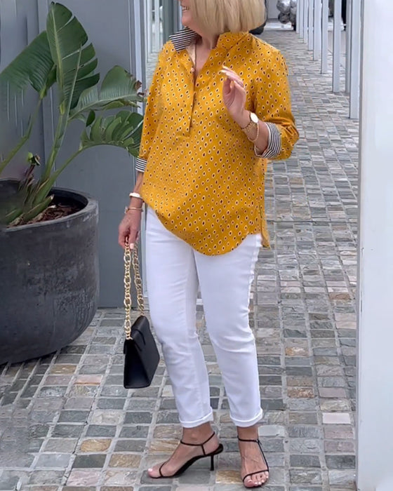 Prikkete jakkeslagsskjorte med 3/4-ermer