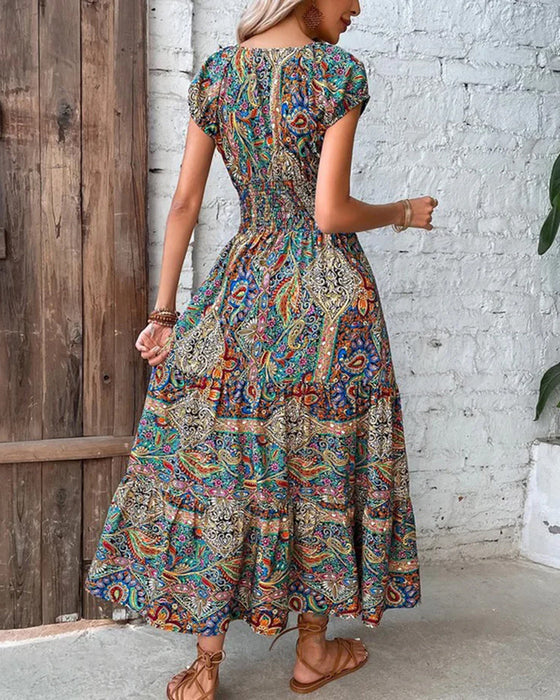 Elegant kjole med vintagetrykk