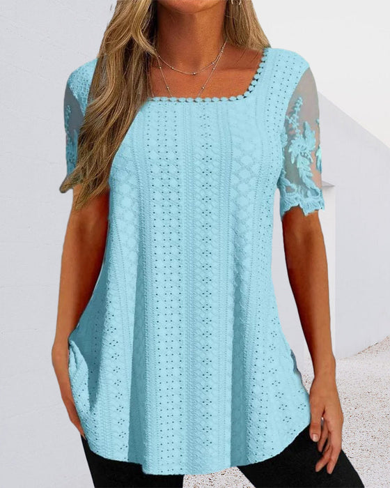 Hul broderibluse i kortermet