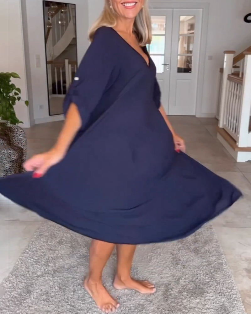 Kjole med ensfarget og v-hals