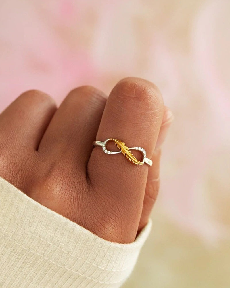 Fjær ring med klassisk tofarget