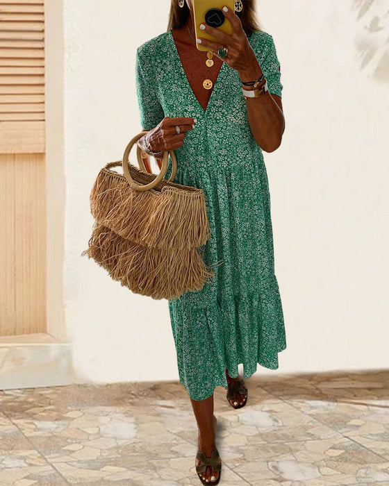 V-hals kjole med blomstertrykk