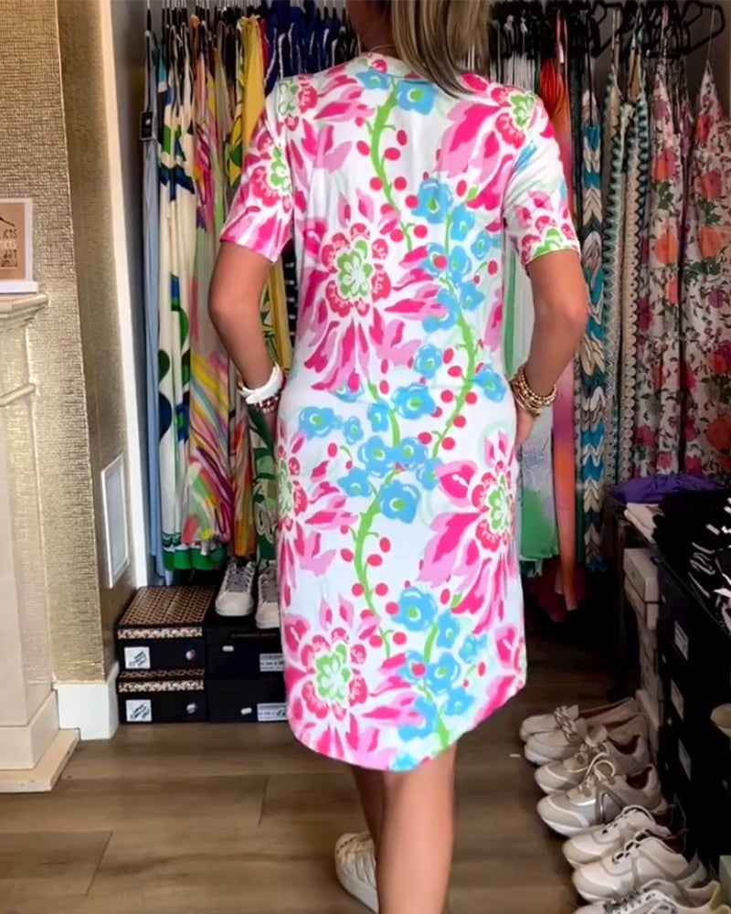 Kjole med korte ermer, blomsterprint og V-hals