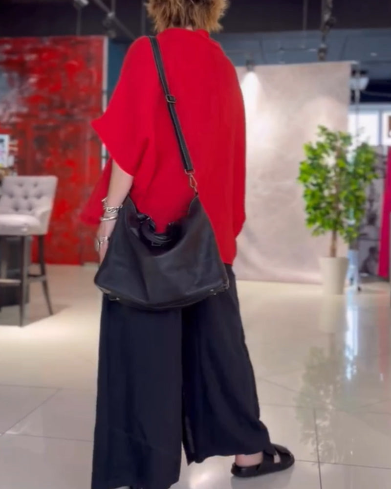 Ensfarget topp med høy hals