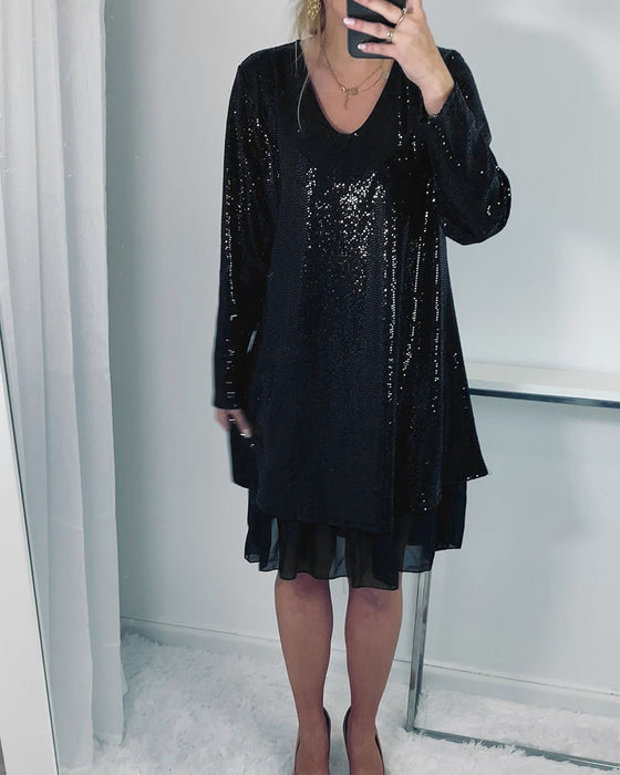 Elegant løs kjole med lang erm